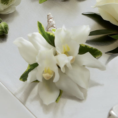 White Mini Cymbidium Boutonniere – HARRY'S FLOWERS, Victoria BC